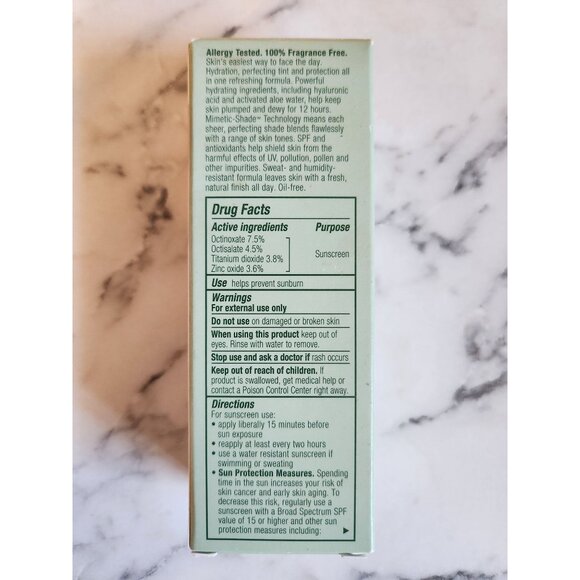 Clinique Moisture Surge Sheertint Hydrator Universal Light Medium 40ml - Picture 6 of 7